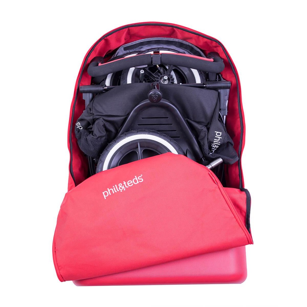phil&teds travel bag loaded with buggy and zipped open top view