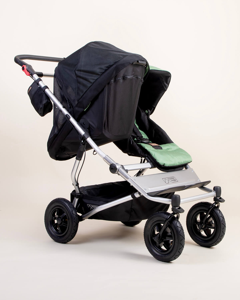 mountain-buggy-carrycot-plus-toddler-seat-Meshcover-on-Duet-buggy.webp